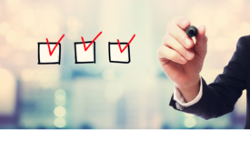 man checking off boxes