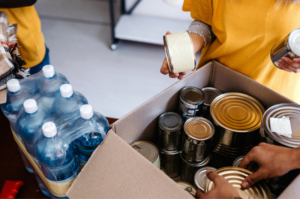 people sorting cans