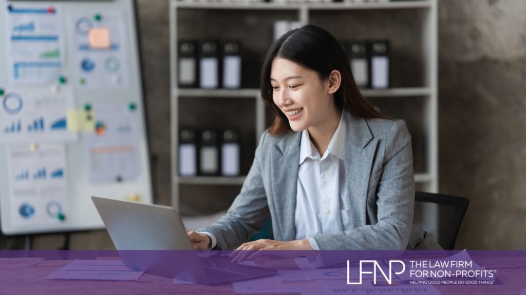 Nonprofit professional reviewing financial reports to maintain public charity status and meet IRS compliance requirements