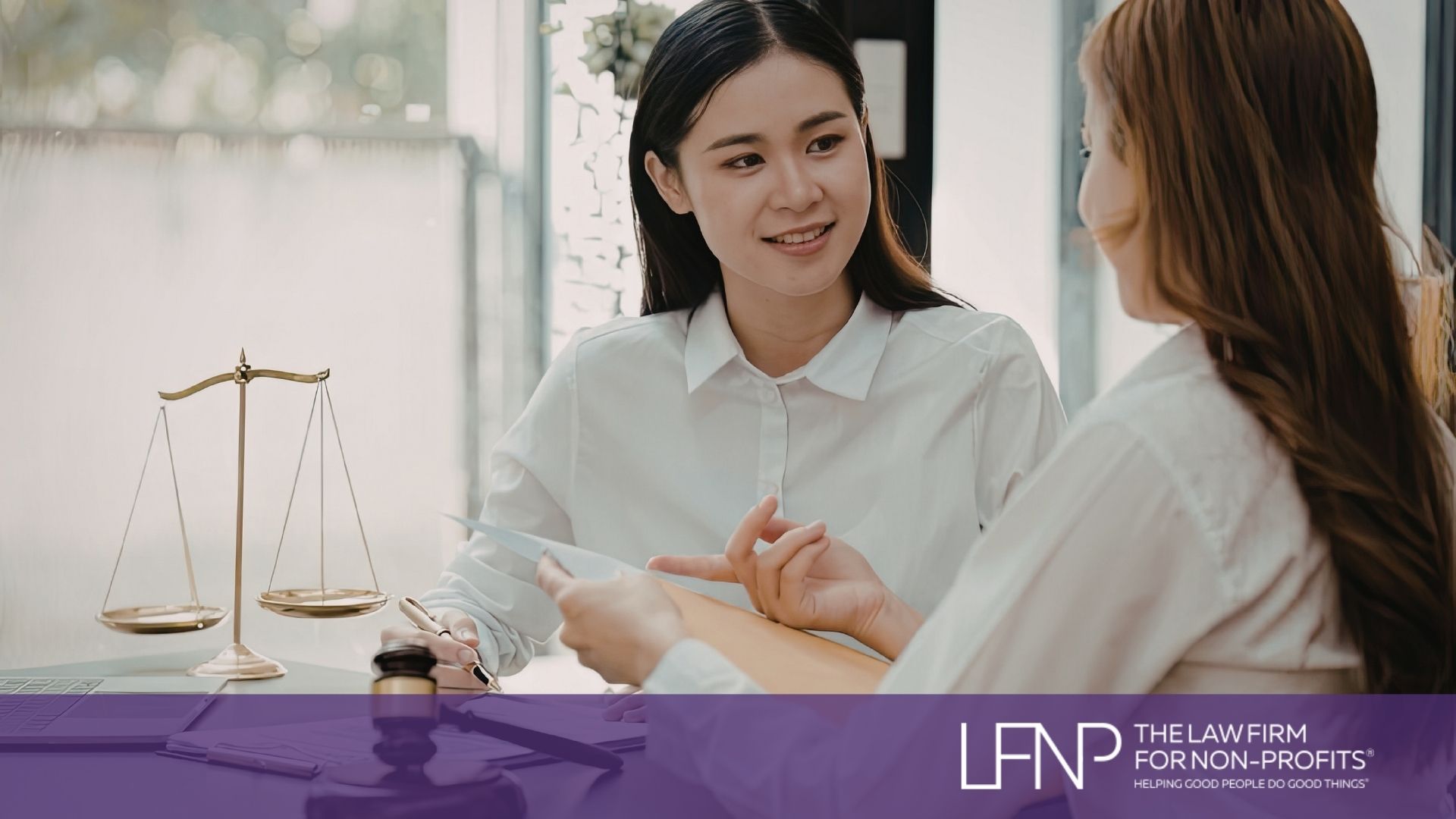 Nonprofit professional reviewing the importance of long-term compliance with client